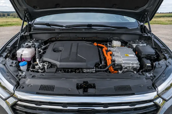 Compartiment d’une hybride avec éléments électriques protégés